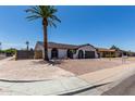 Lovely single-story home featuring desert landscaping, manicured lawn, and a two-car garage at 3765 W Wood Dr, Phoenix, AZ 85029
