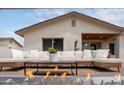 Relaxing outdoor patio with comfortable seating and a modern fire feature, perfect for entertaining at 4948 E Evans Dr, Scottsdale, AZ 85254