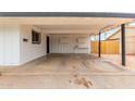 Spacious carport featuring white walls and ceiling, providing ample covered parking at 1515 N Saguaro Dr, Tempe, AZ 85288
