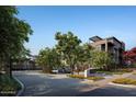Community entrance with gate and attractive landscaping at 19360 N 73Rd St # 1070, Scottsdale, AZ 85255
