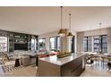 Open-concept living area featuring modern kitchen and spacious seating at 19360 N 73Rd St # 1070, Scottsdale, AZ 85255