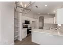 Bright kitchen features new appliances, modern cabinets, and plenty of counter space at 4526 E Bannock St, Phoenix, AZ 85044