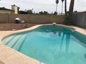 Enjoy outdoor living with this refreshing swimming pool and privacy fence at 12832 N 29Th St, Phoenix, AZ 85032