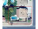 An aerial view of a single-Gathering home, featuring a private pool and lush landscaping at 16202 N 61St Ave, Glendale, AZ 85306