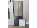 Sample showcasing flooring, cabinetry, and countertop materials, reflecting modern design choices at 17309 W Puget Ave, Waddell, AZ 85355