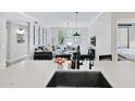 Bright living room with an open floorplan, large windows, and modern decor at 20100 N 78Th Pl # 1023, Scottsdale, AZ 85255