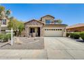 Charming two-story home boasts a stone facade, covered porch, and well-maintained landscaping at 2762 E Clifton Ave, Gilbert, AZ 85295