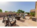 Relaxing outdoor area with comfortable seating around a fire pit, perfect for entertaining or relaxing at 38560 N Joann Way, San Tan Valley, AZ 85140