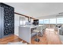 Modern kitchen featuring a white island with seating, stainless steel appliances, and scenic views at 4422 N 75Th St # 8004, Scottsdale, AZ 85251