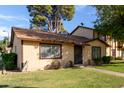 Charming single-story home with a well-maintained lawn and mature shade trees at 6120 N 30Th Ave, Phoenix, AZ 85017