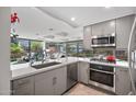 Contemporary kitchen featuring stainless steel appliances, ample counter space, and scenic views at 7141 E Rancho Vista Dr # 6007, Scottsdale, AZ 85251