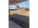 Spacious backyard enclosed by a wooden fence, providing ample room for outdoor activities at 3608 W Hazelwood St, Phoenix, AZ 85019