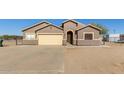 Single-story home with a neutral-colored exterior, an attached two-car garage, and a desert-style front yard at 3720 E Vista Grande --, San Tan Valley, AZ 85140