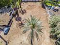 Aerial view of an empty residential lot, surrounded by mature landscaping and block wall fence at 4419 N 46Th Pl, Phoenix, AZ 85018