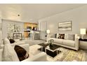 Bright and airy living room featuring stylish decor and an open-concept design at 4704 E Paradise Village N Pkwy # 236, Phoenix, AZ 85032