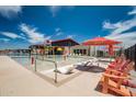 Gathering-friendly pool area featuring splash pad and lounge chairs at 13282 E Verbina Ln, Florence, AZ 85132