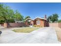 Beautiful brick home with manicured lawn, driveway and lovely exterior at 1650 N 10Th St, Phoenix, AZ 85006