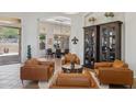 Comfortable living area showcasing stylish decor and lots of light at 1958 W Legends Way, Anthem, AZ 85086