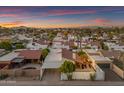 Aerial view of the property showcasing the pool, desert landscaping, and surrounding neighborhood at 2018 E Balboa Dr, Tempe, AZ 85282