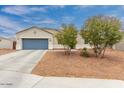 Attractive single-story home with a two-car garage and desert landscaping for easy care at 203 S 190Th Ave, Buckeye, AZ 85326
