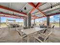 Spacious outdoor dining pavilion with ample seating, perfect for community gatherings and enjoying outdoor meals at 29815 N Oak Dr, Florence, AZ 85132