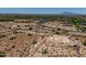 Large desert homesite showing desert landscape, access roads and property lines at 3284 W Highlands Dr, Buckeye, AZ 85396