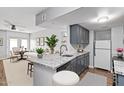 Stylish kitchen features granite countertops and open flow to dining area at 3416 N 44Th St # 70, Phoenix, AZ 85018