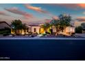 Beautiful single-story home with stone accents, desert landscaping, and an inviting, well-maintained exterior at 40123 N Majesty Trl, Anthem, AZ 85086