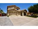 Well-maintained home with large driveway and three-car garage in a Gathering-friendly neighborhood at 44236 W Adobe Cir, Maricopa, AZ 85139