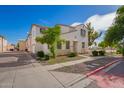 Charming two-story home featuring a desert-themed landscape and a well-manicured yard at 5104 W Fulton St, Phoenix, AZ 85043