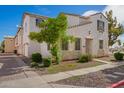 Charming two-story home featuring a desert-themed landscape and a well-manicured yard at 5104 W Fulton St, Phoenix, AZ 85043