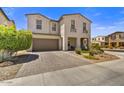 Charming two-story home with a desert landscaped front yard and a two car garage at 6503 E Bluefield Ave, Phoenix, AZ 85054