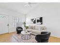 Bright living room with comfortable seating, natural light, and modern decor at 6863 W Sunnyside Dr, Peoria, AZ 85345