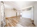 Inviting living room with wood floors and neutral walls at 10951 N 91St Ave # 16, Peoria, AZ 85345