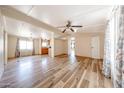 Bright living room with wood floors and open floor plan at 10951 N 91St Ave # 16, Peoria, AZ 85345