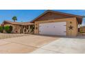 Spacious two car garage with attached living quarters perfect for housing vehicles and/or storage at 4145 W Hayward Ave, Phoenix, AZ 85051