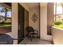 View of private balcony includes sliding glass door access and sleek, modern furniture at 4343 N 21St St # 158, Phoenix, AZ 85016