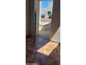 View of tiled entryway with decorative pebbles and shrubs at 4733 W Eva St, Glendale, AZ 85302