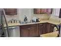 Kitchen showcasing stainless steel appliances and ample counter space at 4733 W Eva St, Glendale, AZ 85302