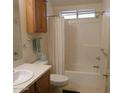 Cozy bathroom with a shower and tub combination and vanity at 5808 E Lockwood St, Mesa, AZ 85215