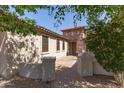 Charming home featuring a stone accent wall, covered entrance, and landscaped pathway at 850 W Folley St, Chandler, AZ 85225