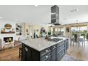 Spacious kitchen with large island, modern appliances, and an open floor plan at 93 E Santa Lucia Ln, Queen Creek, AZ 85140