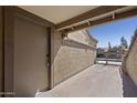 Cozy front porch with secure entry door and a glimpse of the well-maintained community at 200 E Southern Ave # 368, Tempe, AZ 85282
