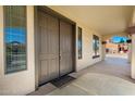 Inviting covered entry featuring double doors and sidelights for a bright welcome at 21538 E Alyssa Ct, Queen Creek, AZ 85142