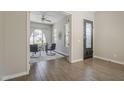 Bright office space with wood floors, a large window and neutral paint at 3310 E Los Gatos Dr, Phoenix, AZ 85050