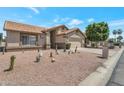 Charming single story home with desert landscaping and a two-car garage at 3755 N 151St Ave, Goodyear, AZ 85395