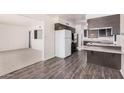Open-concept kitchen and dining area, ideal for Gathering gatherings and casual meals at 5415 E Butte St, Mesa, AZ 85205
