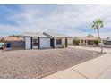 Charming single-story home featuring a low maintenance desert landscaped front yard at 733 W El Prado Rd, Chandler, AZ 85225