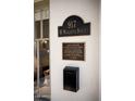 Historic Iles House features a commemorative street sign on the exterior wall at 917 W Willetta St, Phoenix, AZ 85007