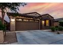 Charming single-story home with a two-car garage and well-maintained landscaping at 9831 E Tupelo Ave, Mesa, AZ 85212
